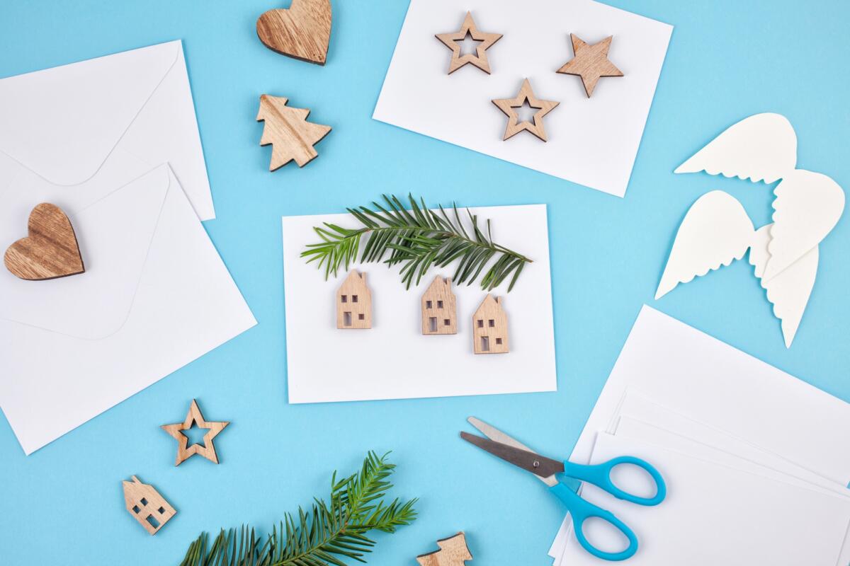 Creative hobby mockup. DIY Christmas greeting cards. Process of
